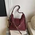 Versatile burgundy leather shoulder bag with decorative puppy charm and contrast stitching - With Charm / Red