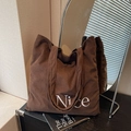 Sac fourre-tout en velours côtelé marron foncé avec broderie Nice et design épuré - café
