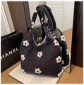 Detail of floral plush tote bag featuring white flower embroidery and checkered lining - Flower Deep Blue