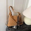 Caramel vintage shoulder bag in soft brushed leather with crossbody strap and dog charm - With Charm / Brown