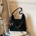 Black leather hobo bag with white stitching and a brown dog-shaped leather charm - With Charm / Black