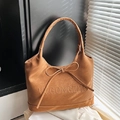 Brown faux suede underarm bag with decorative bow and elegant letter embossing - Brown with Letters