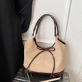 Beige suede and brown leather tote bag with bow detail on a silver suitcase - Khaki with Letters
