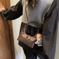 Vintage brown leather half-moon crossbody bag with a cute teddy bear charm - Coffee (With Pendant)