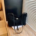 Classic black faux suede tote bag with elegant gold cross clasp and long shoulder strap - Black