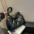 Chic black quilted shoulder bag with rhombus pattern and wide strap in variant color - Black