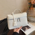 Chic cream litchi texture shoulder bag with silver double zipper and top handle - White