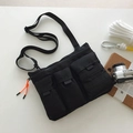 Sacoche tactique noire en nylon avec trois poches cargo et tirettes orange vif - Noir