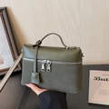 Minimalist olive green leather handbag with dual zipper closure and silver hardware details - Green