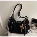Detail of black nylon tote bag with metal zippers, cute bear charm and star pendant - Single Bag / Black
