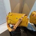 Ginger yellow crossbody bag with wide jacquard shoulder strap and multi-pocket nylon design - Yellow