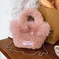 Rosa Plüsch-Handtasche aus Lammfell-Imitat mit goldener Metallkette und Webetikett - Rosa