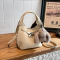 Beige lychee pattern leather bucket bag with top handle and plush rabbit pendant charm - White with Pendant