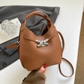 Brown litchi grain leather bucket bag with silver twist lock and adjustable strap - Brown No Pendant