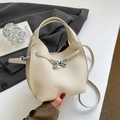 Chic cream litchi grain bucket bag with silver twist lock and crossbody strap - White Without Pendant