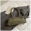 Detail of olive green leather bag with gold buckle and strap on a gray blazer - Large / Green