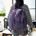 Deep purple pleated nylon backpack with multi-pocket design and adjustable straps - Purple