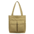 Detail of khaki tote bag featuring large utility flap pockets and durable nylon fabric - Khaki