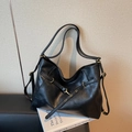 Large black hobo shoulder bag in oily faux leather with golden metal buckle and strap - Black