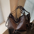 Dark brown large tote bag with fine pleated texture and gold hardware accents - Brown