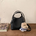 Detail of black lychee texture leather tote bag with cute puppy pendant and strap - Black (With Pendant)