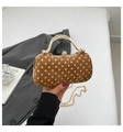 Chic brown suede bag with white dots featuring gold handle and rhinestone clasp detail - Brown
