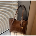 Dark brown faux crocodile tote bag with gold lettering and decorative bag charm - Brown (With Pendant)