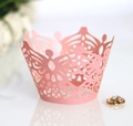 Detailed macro view of laser-cut pink cupcake wrapper with intricate floral crown pattern - 5cm / Pink