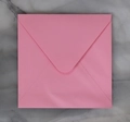 Square pink paper envelope with V-flap design on grey marble background detail - Crimson Square