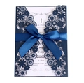 Elegant navy blue laser-cut wedding invitation with white insert and satin ribbon bow - Deep Blue