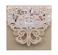 Close-up of laser-cut wedding invitation with vintage kraft paper and floral insert card - Champagne Gold