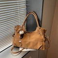 Brown faux leather tote bag with white contrast stitching and a plush ball charm - With Charm / Brown