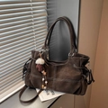 Deep brown tote bag with white contrast stitching, drawstring sides and fur ball charm - With Charm / Coffee