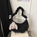 Detail of black moon bag with pleated handle and cute white plush bunny charm - Black with Pendant