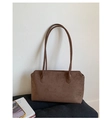 Close-up of brown suede tote bag texture and thin shoulder straps in a minimalist setting - One Size / Coffee