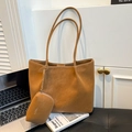 Caramel faux suede tote bag set with laptop and book in a minimalist office setting - Brown