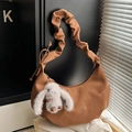 Brown hobo shoulder bag with pleated cloud strap and plush rabbit charm accessory - Brown with Pendant