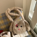 Süße Lammwolltasche in Beige mit Cartoon-Tiergesicht und einer roten Schleifenverzierung - Khaki
