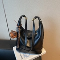 Black leather hobo tote bag with white contrast stitching and a plush bear charm - With Charm / Black