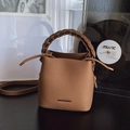 Brown litchi grain leather bucket bag with woven handle and fringe drawstring detail - Brown No Pendant