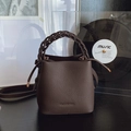 Dark brown bucket bag with lychee texture, woven handle and drawstring closure - Coffee without Pendant
