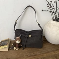 Retro large grey matte leather tote bag with gold lock and plush bear on wood surface - Coffee with Pendant