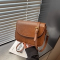 Brown vintage leather shoulder bag with gold hardware and fashion flap closure - Brown