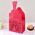 Laser-cut red wedding favor candy box with castle design and Wedding Day text on white surface - Pearlescent Red