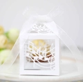 White laser-cut music note gift box with ribbon and gold foil chocolate inside - White