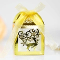 Golden laser-cut Christmas candy box with reindeer and snowflake patterns and yellow ribbon - Reflective Gold