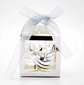 Detail of laser-cut musical note pattern on white wedding favor box with blue ribbon bow - Reflective Silver