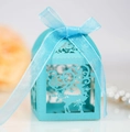 Detail of light blue laser-cut reindeer gift box with pearlescent finish and ribbon - Tiffany Blue