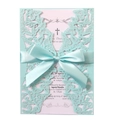 Close-up of laser-cut butterfly invitation with Tiffany blue ribbon and cross detail - Tiffany Blue