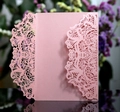 Detail of pink pearlescent laser cut lace floral invitation cover for weddings - Pink